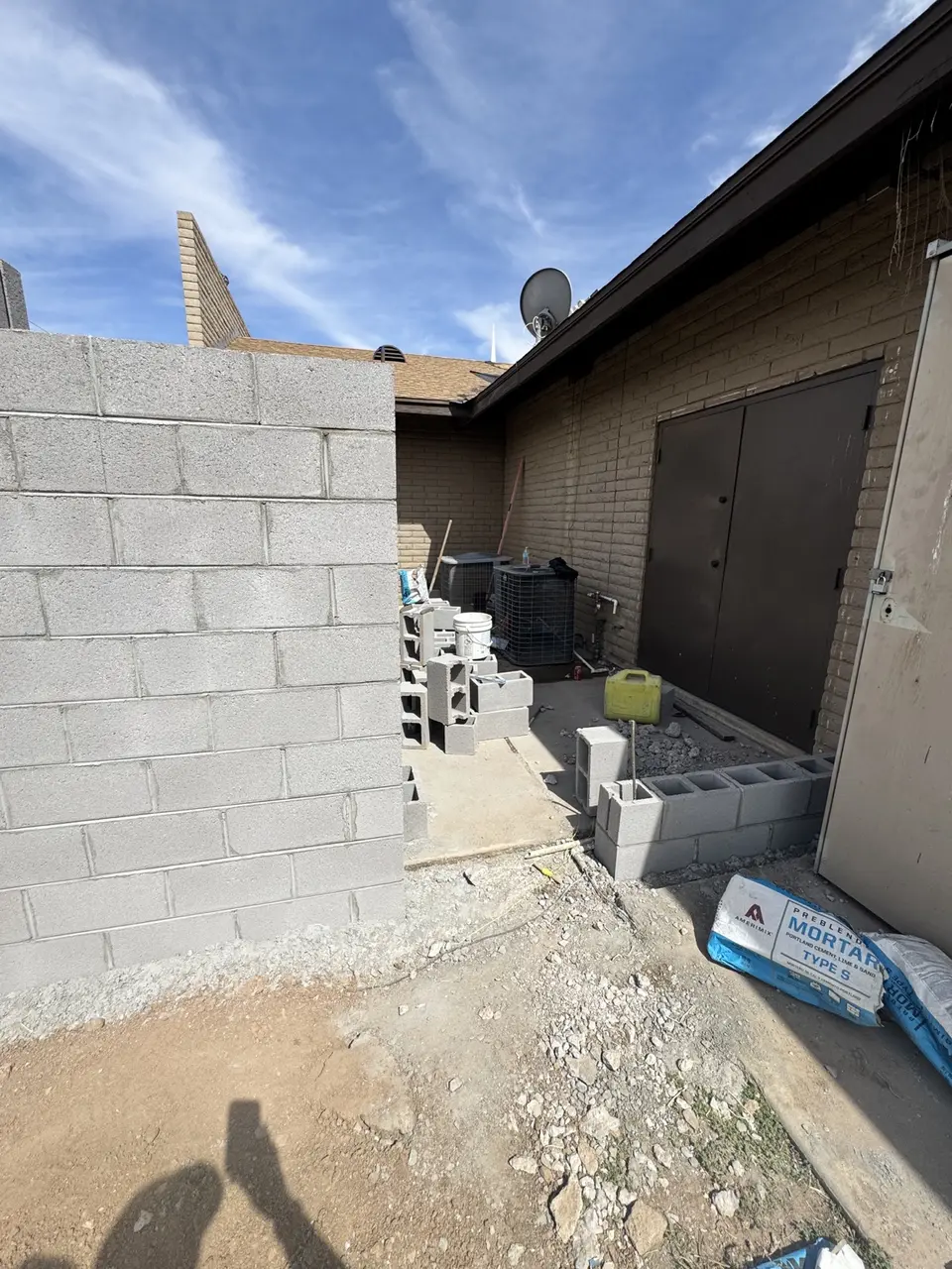 CMU enclosure and reinforced gate opening during construction in Phoenix